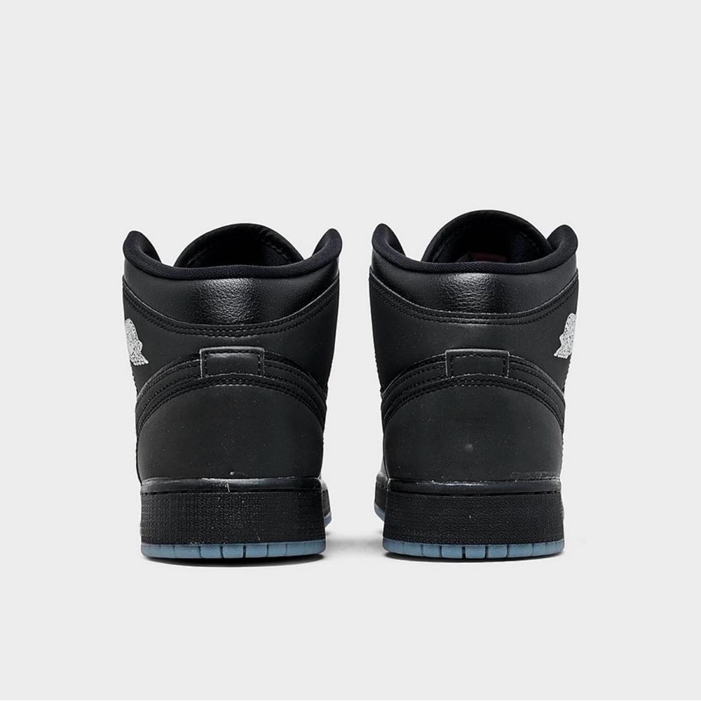 Sleek Black High-Top Sneakers with Glossy Finish